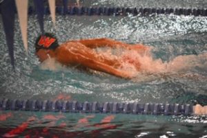 Fields swims the butterfly in a meet against Stratford at Woodforest natatorium in 2018.