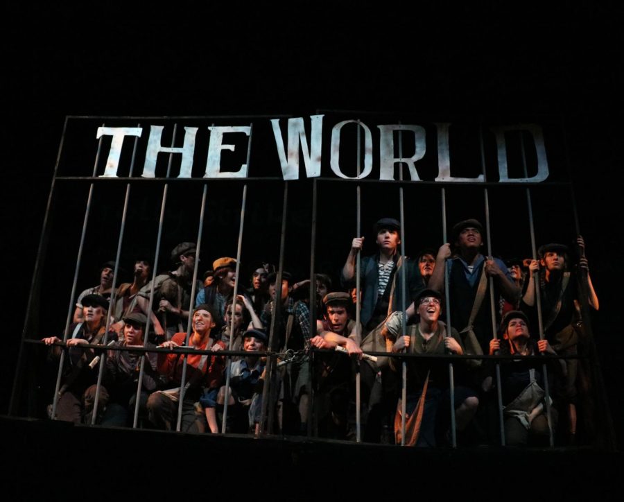 Newsies are locked out at The World, while contemplating their choices.  
