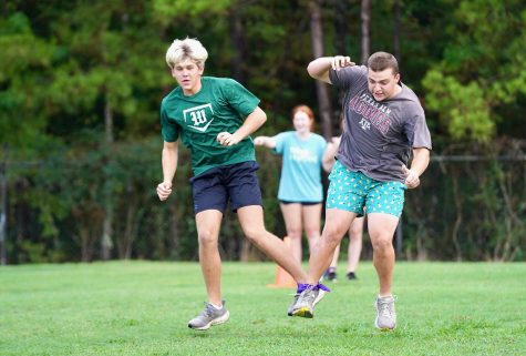 Seniors participated in games including three-legged races.  The games were held on the soccer practice fields behind the school.