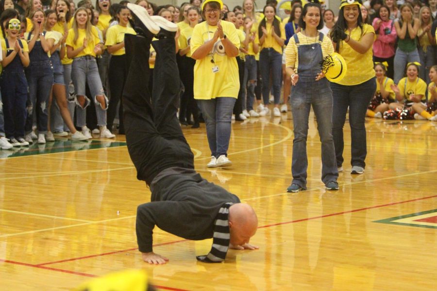 Coach Mac shows the students how its done at the Minions Peprally