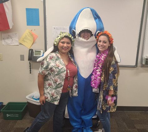 Ms. Davis, left and Ms. Leleux (center, shark) and Ms. Harrington,    right, at the Back from the Beach pep rally last week at TWHS.