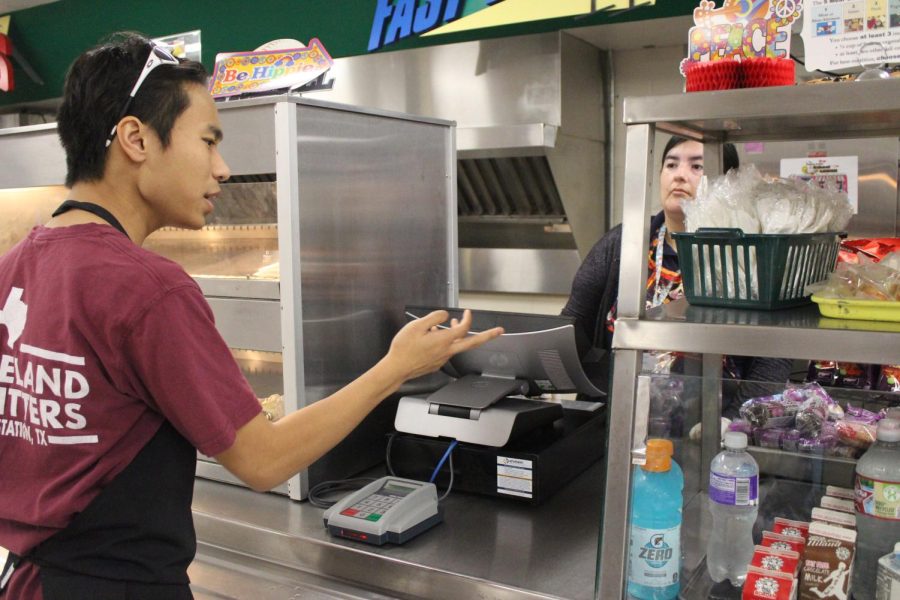 Students buying food in the cafeteria last week.