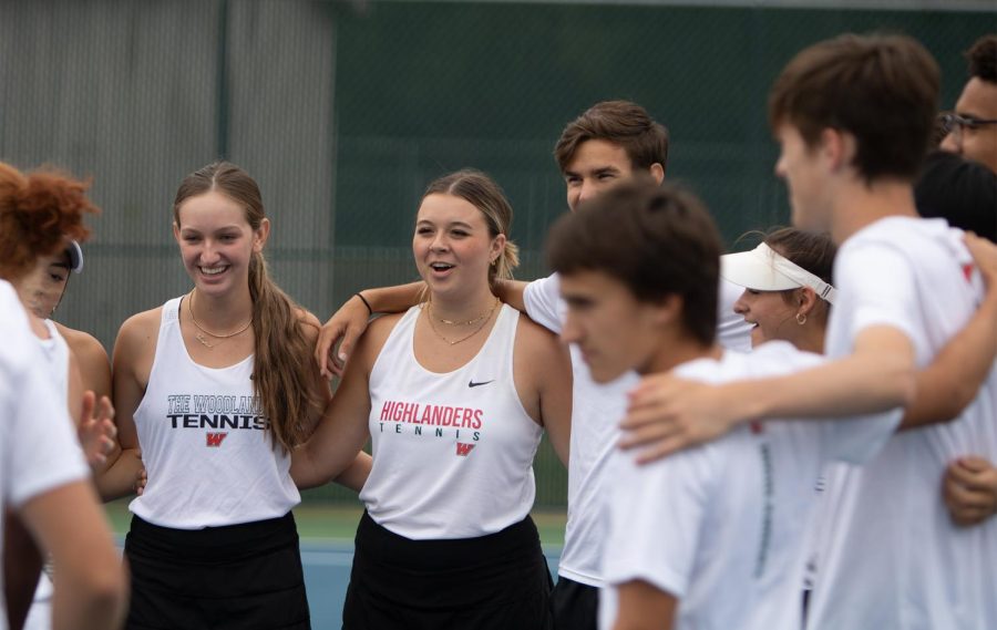 The tennis team warmed up together before a match.  Now that the team tennis season is over, they will prepare for the spring tennis season.