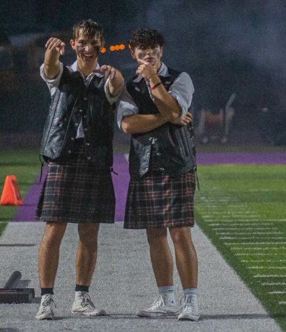 Grant (left) and Timmy (right) on the sidelines against Willis on Oct. 28 at Willis ISDs stadium.