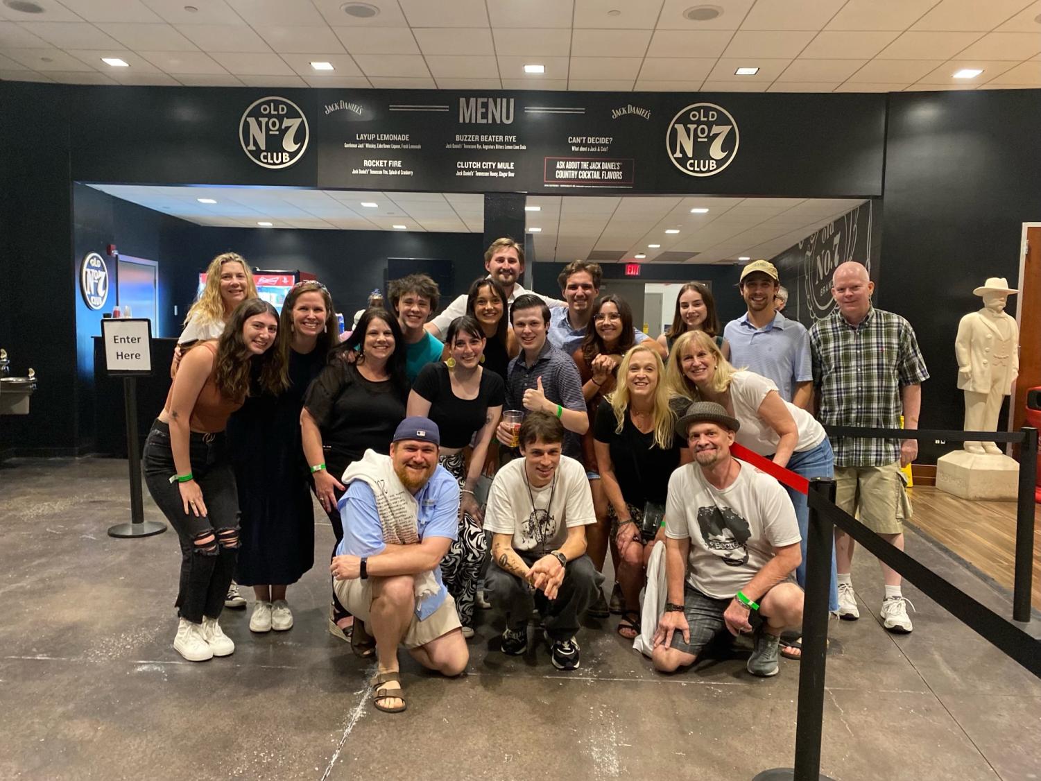 Peter McPoland, center, surrounded by former teachers, former classmates and good friends, including Gigi Paduano (in black at center) who came from Chicago to attend the show.