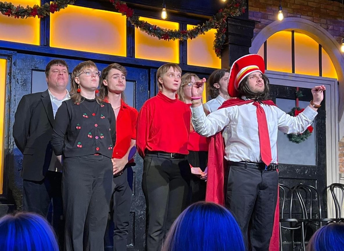 Shelby Steele, second from left, performs on stage in Dec. 15 in Chicago at Second City with her classmates.
