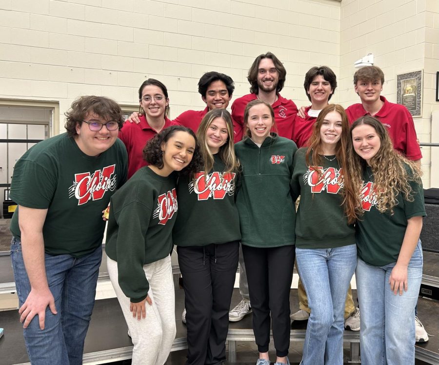 The choir students that advanced: (l to r) Bottom row in green:  Rhett Hollier, Kayla Lewis, Emma Barnard, Claire Persyn, Greta Lamb and Sophia Hickman-Chow - back row in red:  Maren Eaton, Santino Hallare, McClain Weaver, Wiley Sadlier and Tyler Hedgepeth.