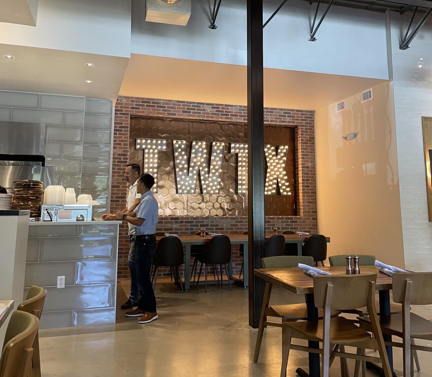 The interior of Local Table has a cute wall, worthy of Instagram.