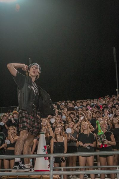 Grady Barrows pumping up the crowd at the football game. 