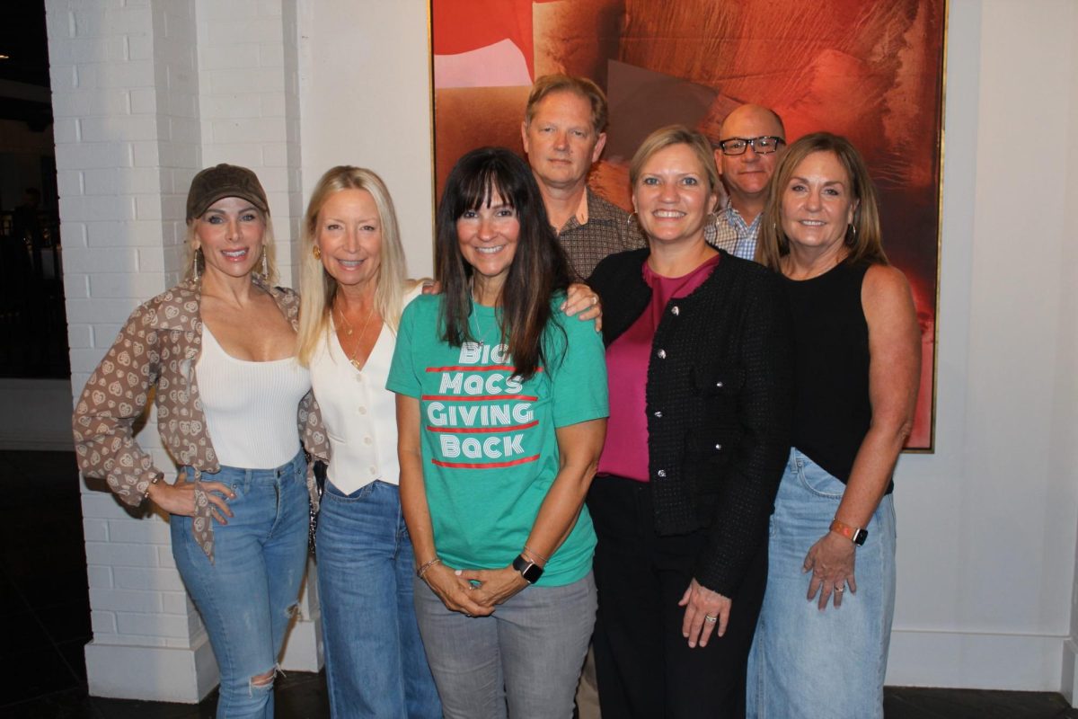 From left to right Susan Giaconca, Katie Brannon, Missy Flanagan, Jo Ann Linzer, and Kristy Easton in the front with David Priest and Benny Landrum in the back.