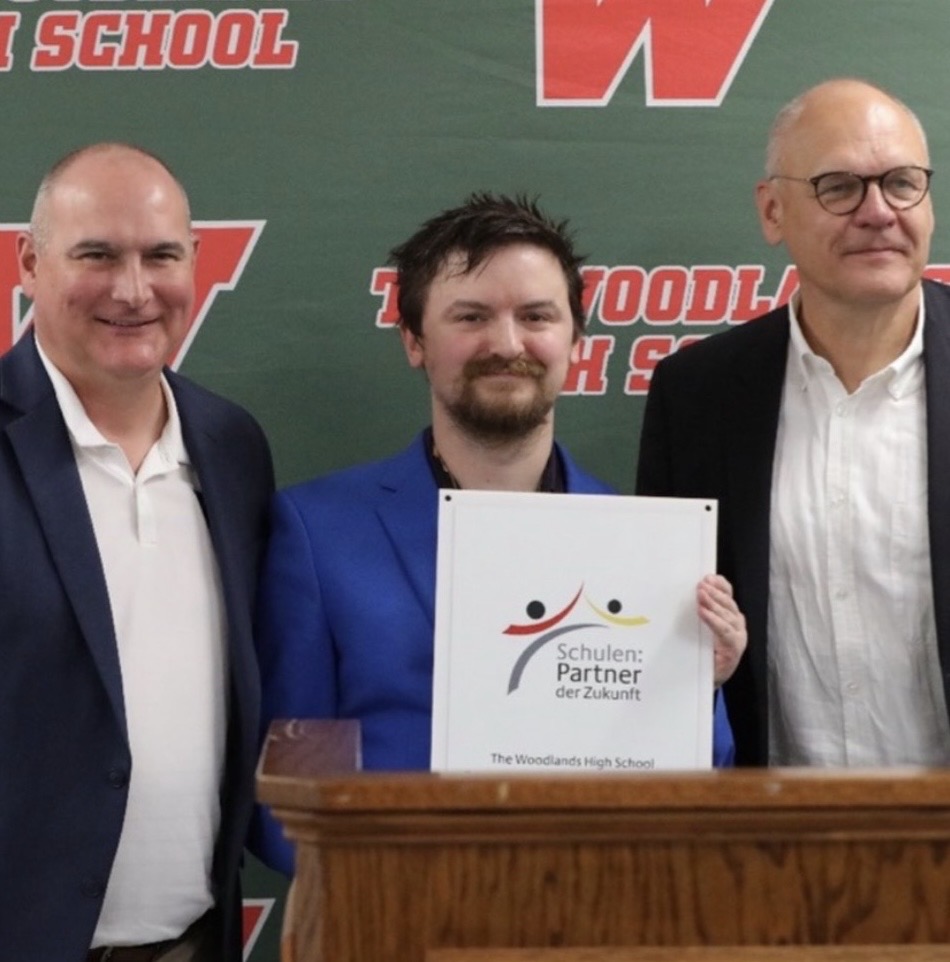 Mr. Muehsler, TWHS Principal, Mr. Wynne, German Teacher, and Johannes Ebert, Secretary General Gorthe-Institut,    showcasing the award recognizing The Woodlands as a PASCH school. TWHS is the first in Texas to receive the award, and one out of 14 in the United States.