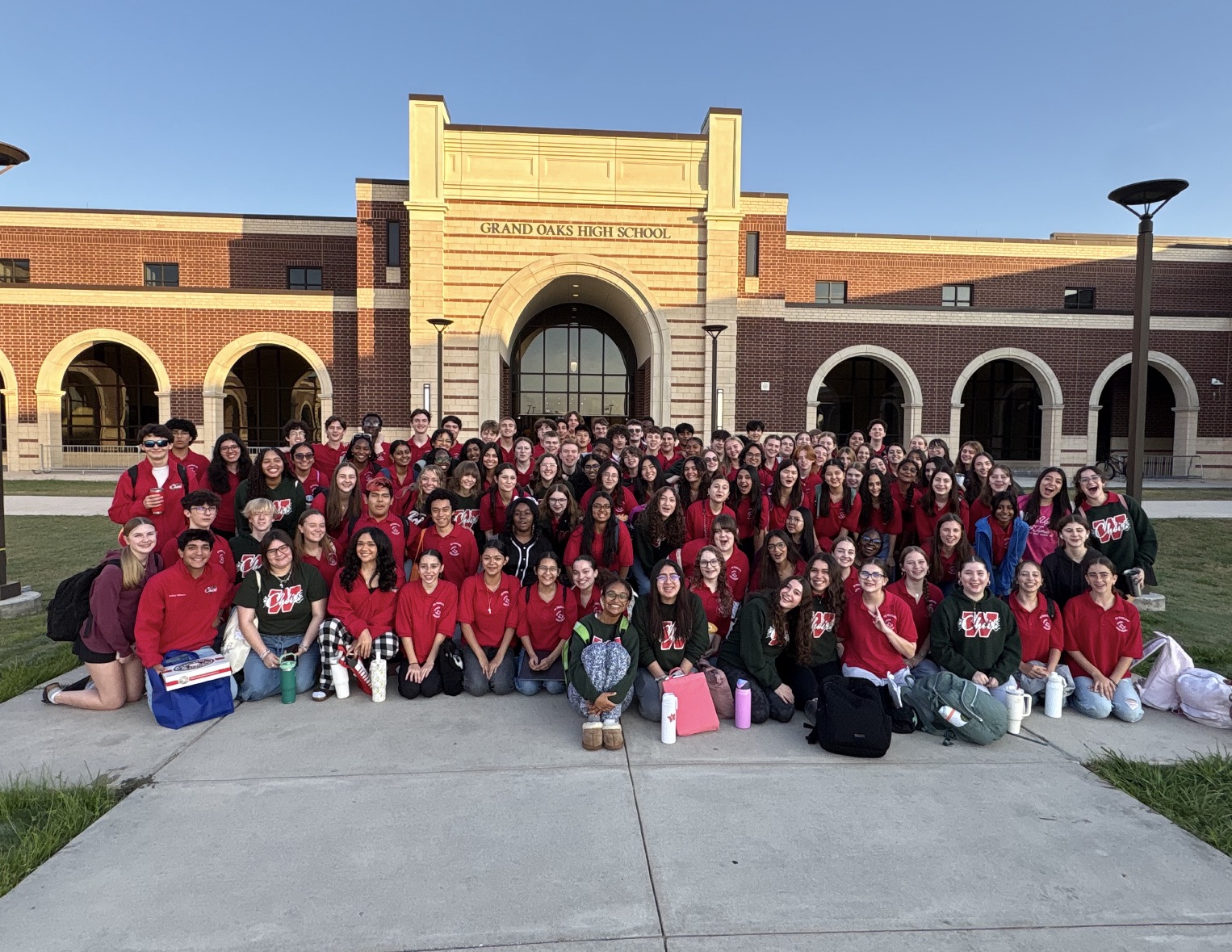 TWHS Choir students posing in front of Grand Oaks High School at district auditions provided by the Choir Department. 