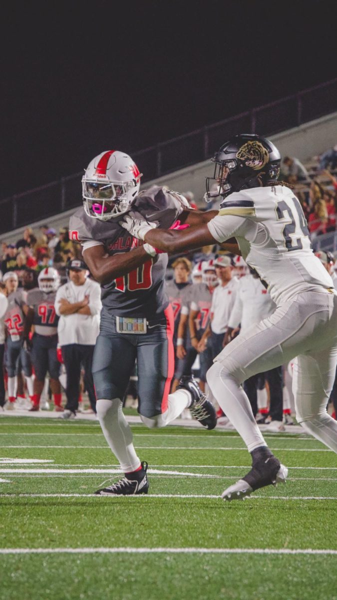 Jr WR Bryson Bourne #10 blocking on a TWHS rush play