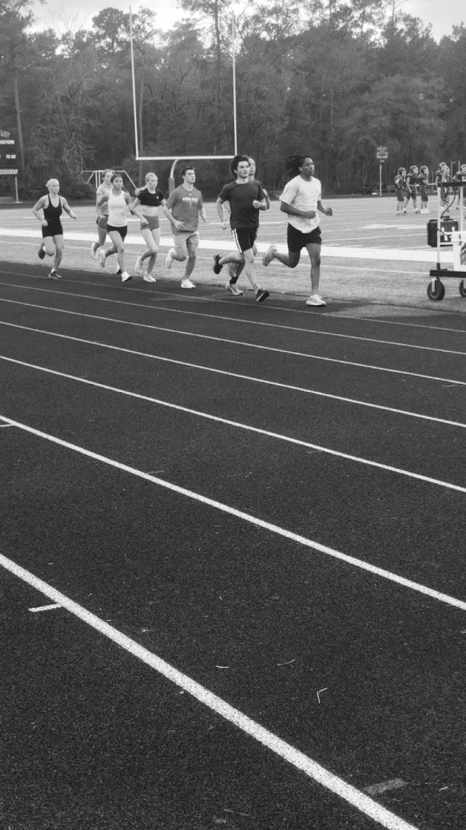 TWHS Track and Field 4x8 team practicing for the 400m. 