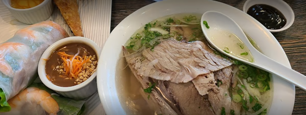 A photo of the shrimp spring rolls and Pho Tai at Mai's. Photo by Catherine Gentry, used with permission.
