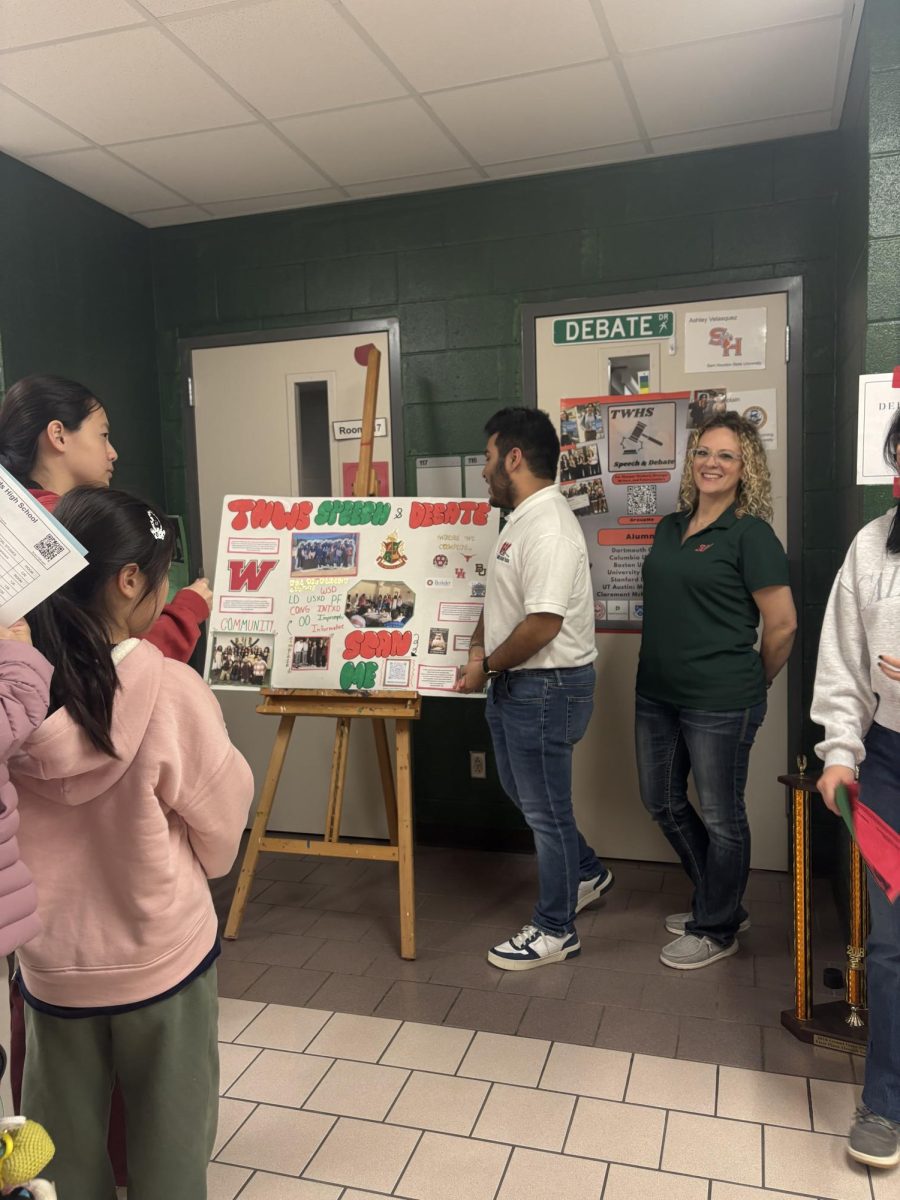 Arman Essani (11th) presenting his poster Speech & Debate at the Elective Fair on 1-15-2026.