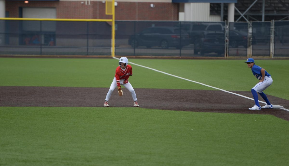 Colton Lillard taking his lead off of first base during the spring 2026 baseball season. Photo by Ashley Moore, used with permission.