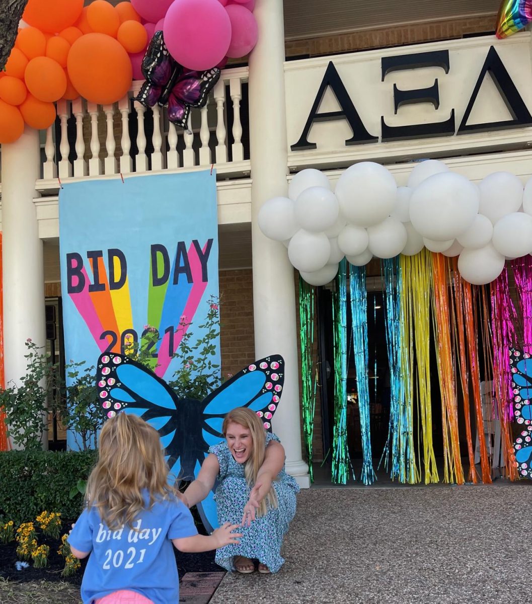  Alpha Xi Delta in Austin, Texas. Pictured is daughter Austin Grace Doran and mother Molly Laughlin Doran, the first bid day Austin attended and participated in the festivities. Photo by Whitney Wurzberger, used with permission.