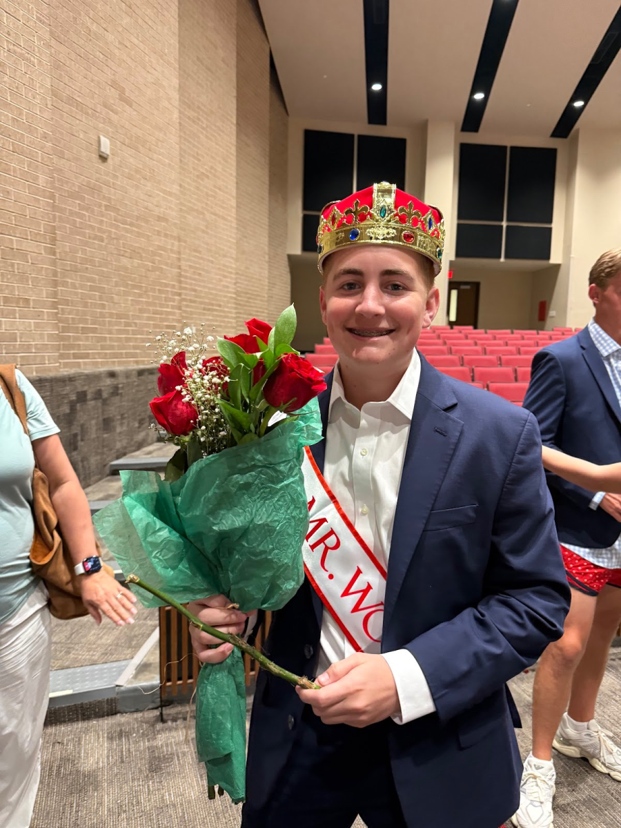 Senior Camden Engelman wins the title of Mr. Woodlands. 

